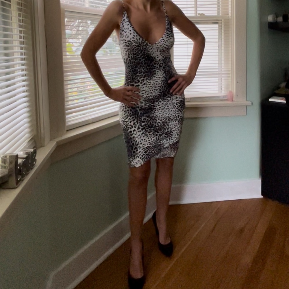 Animal print sexy dress by BEbe